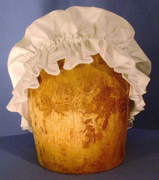 Mob Cap by White Pavilion Costumes, front view. This cap is perfect for living history reenactors in all eras from the medieval through the renaissance, 17th and 18th centuries, and into Victorian times. It's also a perfect accent for fantasy and fairytale costumes.